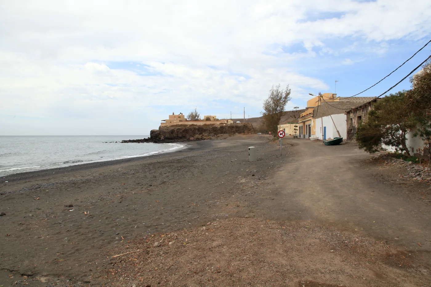 The bay of La Lajita with fishing boats on the shore